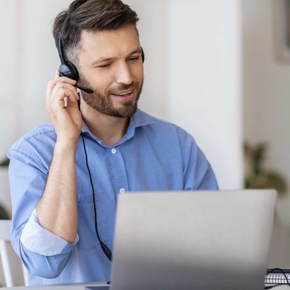 hotline-operator-portrait-of-call-center-employee-wearing-headset-at-workplace-in-office.jpg hotline-operator-portrait-of-call-center-employee-wearing-headset-at-workplace-in-office.jpg